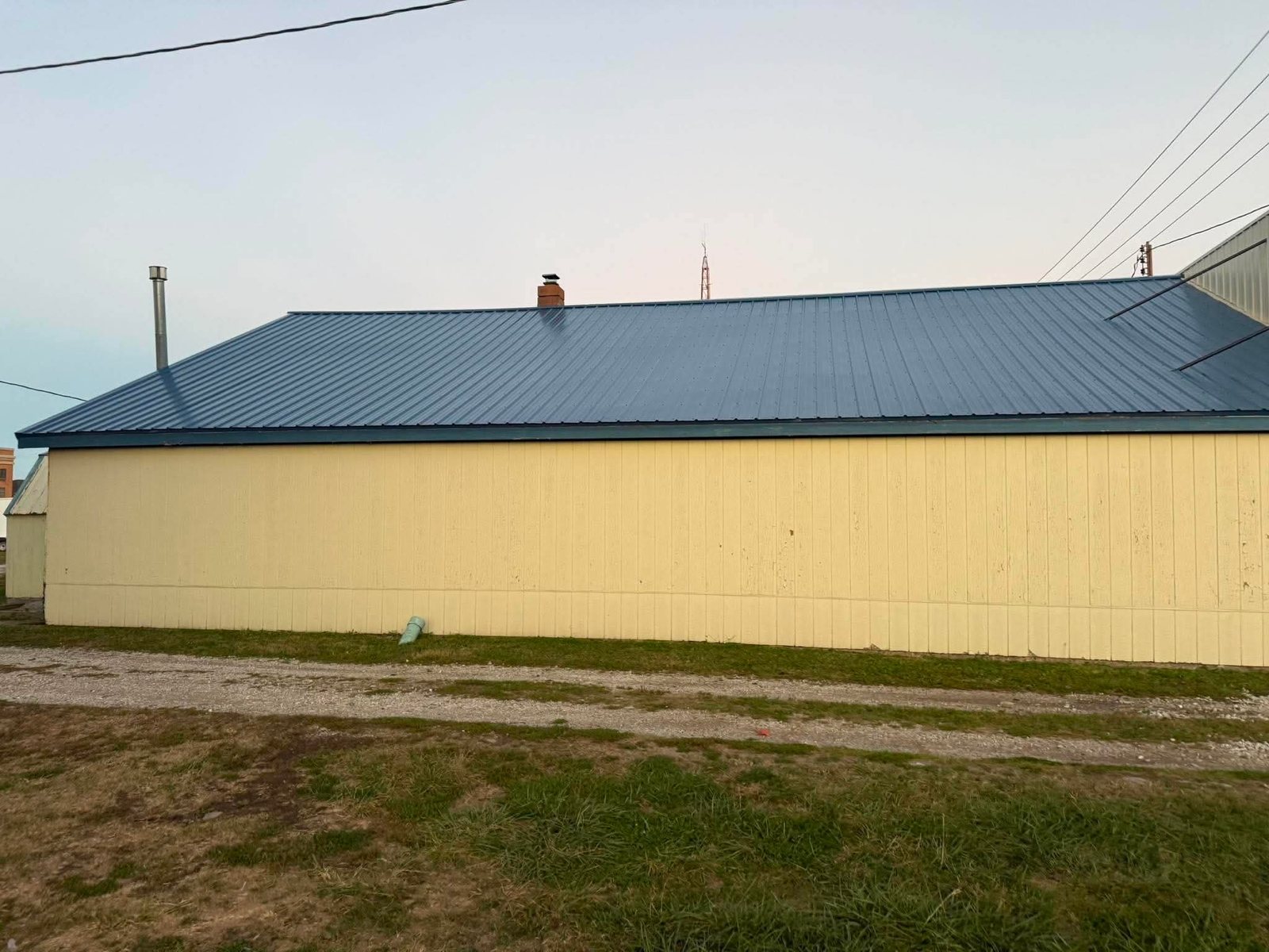 Blue standing seam metal roof on a building